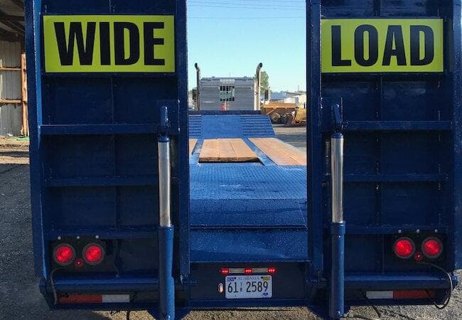 Blue heavy equipment trailer decal replacement